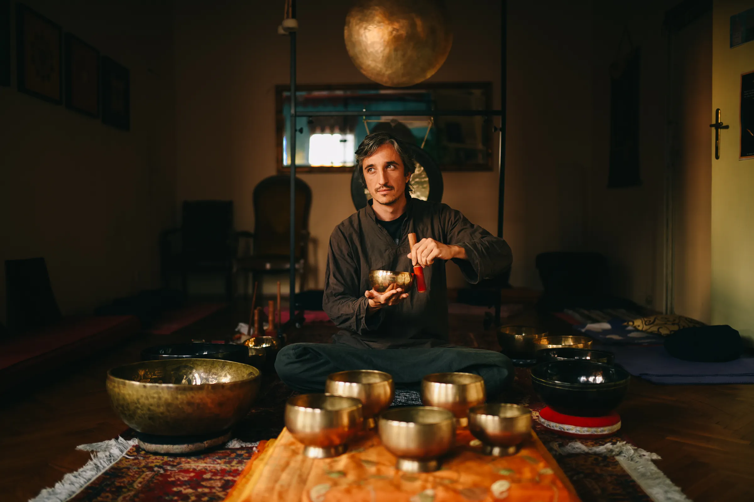 Mladen preparing gongs and singing bowls for Private Sound Healing